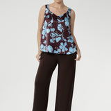 Our signature Monroe Pant is loved for its luxe drape and easy wear. Made from heavy-weight dry-touch stretch jersey, it features a pull-on waist, deep double waistband, side pockets, and a straight-leg silhouette with a deep hem. Designed for comfort and versatility, it’s available in three lengths, sizes 8–24, and pairs effortlessly with our fluid suiting pieces.