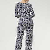 A timeless straight-leg pant designed to move effortlessly from the office to the weekend. Shown here, our size 10 model wears the Kyle Top in Ink Olympia paired with the matching Monroe Pant in Ink Olympia, styled together for a chic, printed jumpsuit effect. Available in sizes 8 to 24, with a choice of three leg lengths for the perfect fit.