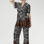 Crafted from our signature deluxe slinky jersey, our best-selling Monroe Pant offers the perfect balance of versatility and sophistication. Size 10 woman wears her 