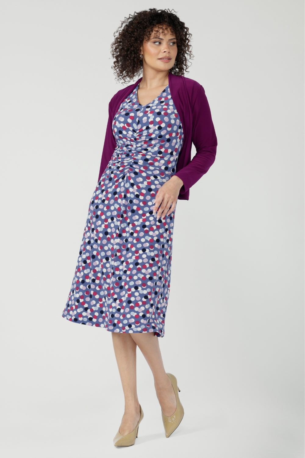 The Nadine Dress is an elegantly subtle aline dress with fashion forward ruched sleeves, perfect for layering as the weather gets cooler.