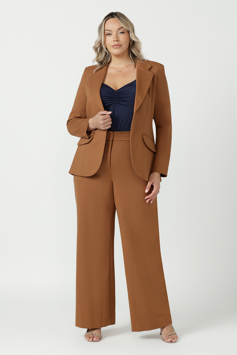 Toffee Longline Tailored Jacket with a structured fit and comfortable four-way stretch, designed for modern workwear.