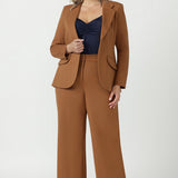 Toffee Longline Tailored Jacket with a structured fit and comfortable four-way stretch, designed for modern workwear.