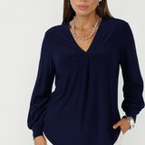 The Paeton Top in Navy is a timeless women’s workwear essential, crafted from dry-touch stretch jersey for all-day comfort.