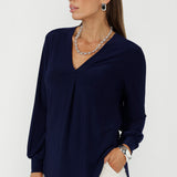 Elevate your wardrobe with this navy essential, ideal for travel-friendly outfits and refined, comfortable dressing.