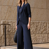 Crafted from our luxe, body-contouring scuba jersey, the Drew Pant features a sophisticated high-rise cut with a refined leg profile, and angled front pockets.