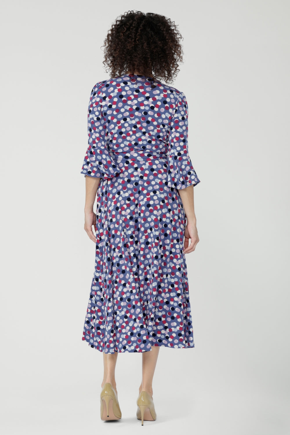 Wrap dress featuring fluted 3/4 sleeves with gathered detail, and pockets, it’s designed with comfort, elegance and movement in mind.