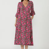 Portia Wrap Dress crafted from signature dry-touch stretch jersey, featuring a flattering wrap neckline, elegant fluted sleeves and effortless day-to-evening versatility.