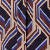 Showcasing a bold geometric striped print fabric used to create a women's swing shirt. By Leina + Fleur in sizes 8-24. Made in Australia. Plus size friednly & petite height friendly womens clothing.