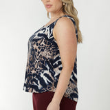 Relaxed-fit women’s top featuring a flattering square neck, sleeveless silhouette and curved back hem for added coverage and easy styling.