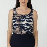 Australian-made women’s relaxed-fit top featuring a modern square neckline, wide shoulder straps and a flattering longer curved back hem.