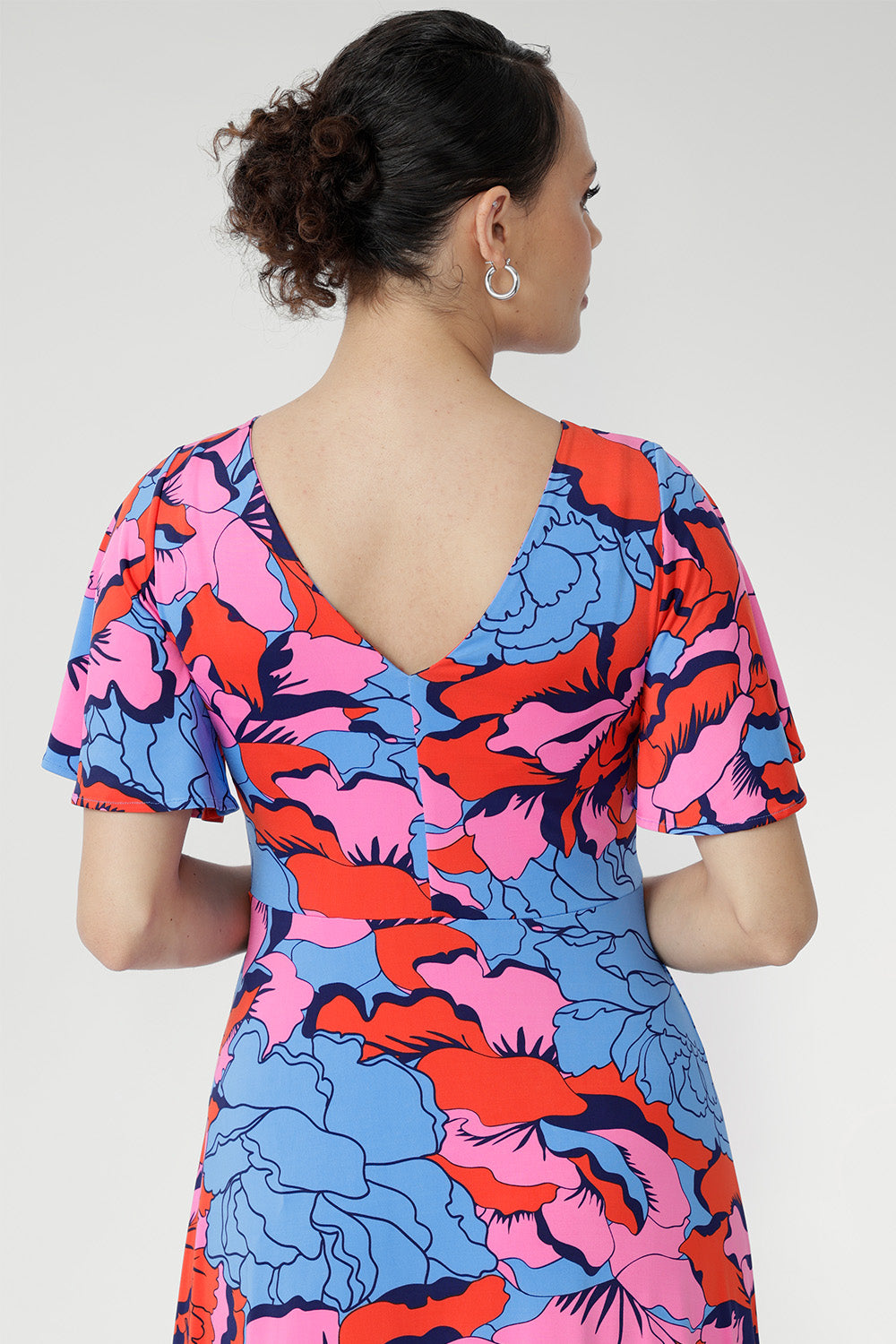 Women showcases floral dress in Can Can print 