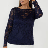 The Sabrina Lace Top blends sheer elegance with soft tailoring, crafted from premium stretch lace for a comfortable fit. Featuring bust darts, scalloped sleeves, and a boat neckline, it’s a versatile piece for workwear, events, and after-dark styling in sizes 8–24.