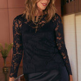 The Sabrina Lace Top is a standout in women’s workwear Australia, crafted from premium stretch lace with a sheer, flattering fit. 