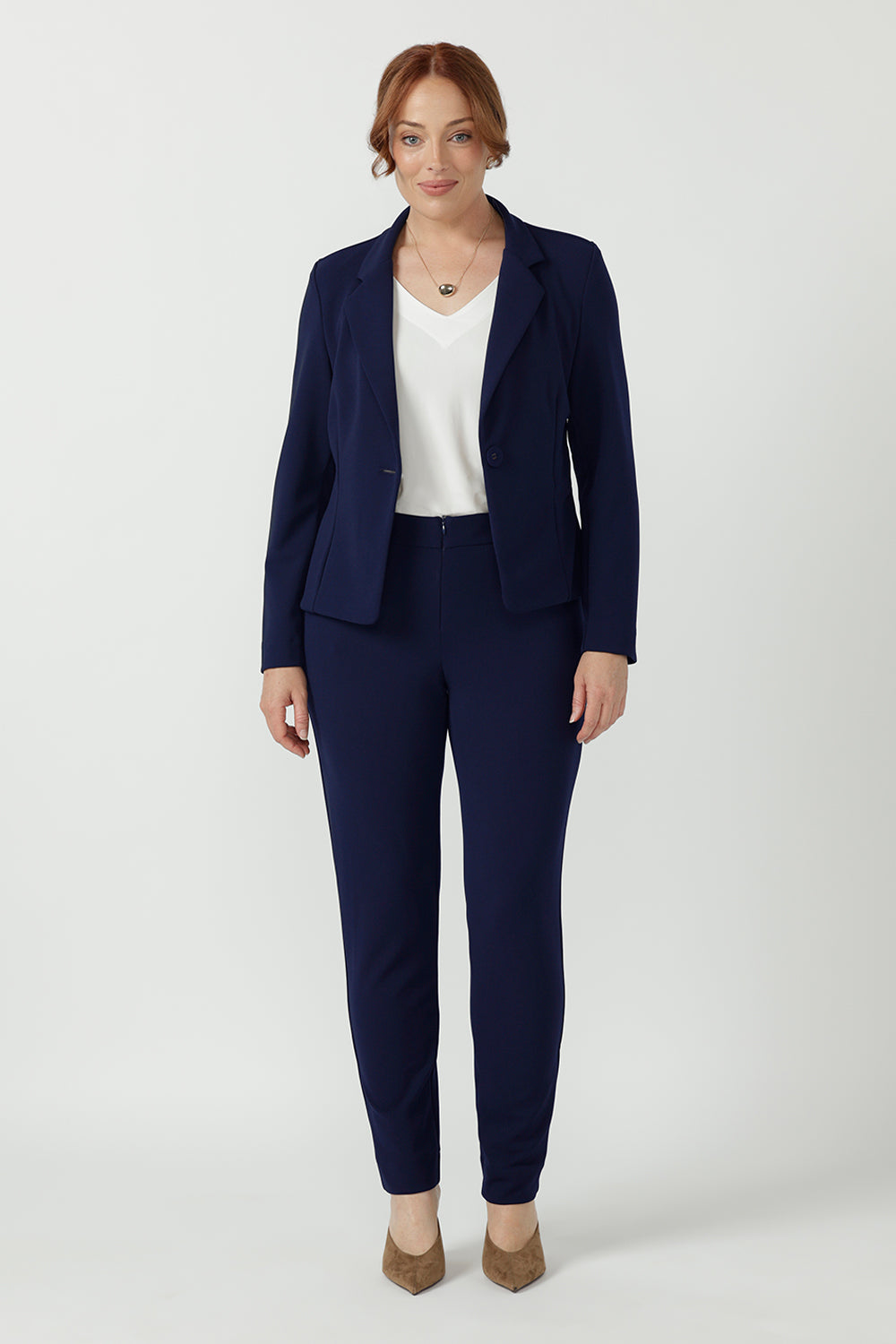 Elegant women's Sara Jacket featuring soft stretch Smart Crepe fabric, refined tailoring, full-length sleeves and a versatile button-up design for work and everyday wear.