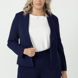 Timeless women's tailored jacket featuring classic notch lapels, a flattering shortline silhouette and comfortable stretch fabric for effortless everyday elegance.