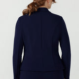 Versatile Sara Jacket in textured Smart Crepe Jersey, featuring a tailored silhouette, button-up closure and structured back panels for a polished finish.