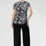 The Sawyer Top is a wardrobe essential that transitions seamlessly from smart workwear to casual weekend looks.