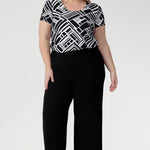 The Sawyer Top is a women's blouse with scoop neckline and pairs beautifully with skirts, trousers, and denim for effortless everyday styling. Short sleeved top is perfect for everyday styling and fits comfortably under blazers. 