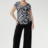 The Sawyer Top is a wardrobe essential that transitions seamlessly from smart workwear to casual weekend looks. Lightweight, wrinkle-resistant, and easy to pack, it’s an ideal travel piece for women who value both style and practicality.