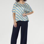 The Blue Sky Stripe print blends soft sky blue and vanilla tones, giving this tee a fresh, modern aesthetic. The diagonal stripe design adds subtle movement and visual interest to an everyday essential.