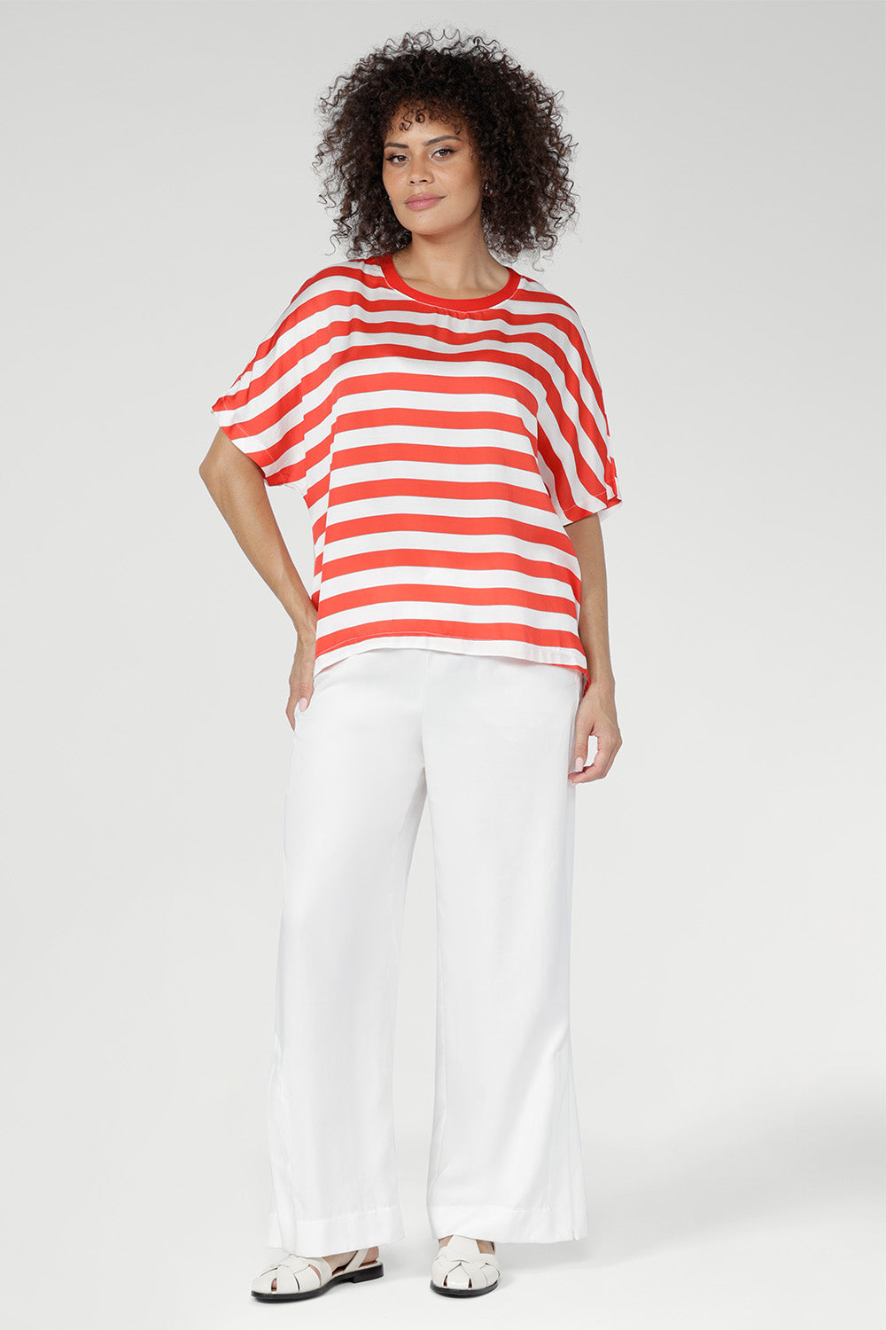 Finished with a straight hemline for clean lines and versatility, the Scout Tee pairs seamlessly with denim, tailored pants, or skirts. 