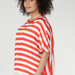 The Tang Stripe, blending fresh red and vanilla hues, adds a modern twist to timeless stripes—perfect for casual styling or layering under jackets and knits.