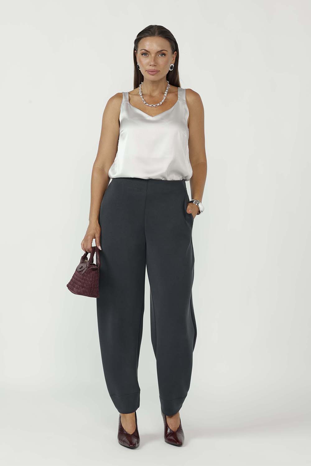 Featuring a modern barrel leg silhouette, flattering mid-rise fit, and refined tailoring, these versatile women’s pants are proudly designed and made in Australia in sizes 8–24.