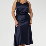 This Ink Satin range offers a lustrous finish with ease of movement - effortless, polished, and perfect from evening drinks to late-night events. Available in sizes 8-24.