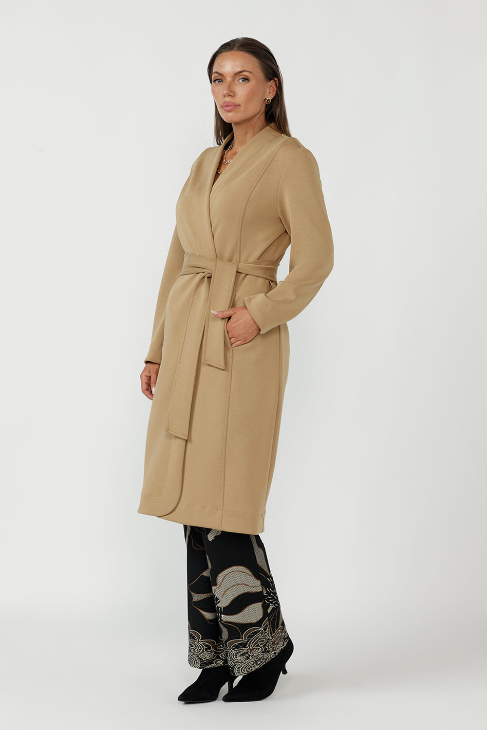 Modern Sorel Trench Coat in premium Modal stretch fabric with a grown-on neckline, concealed pockets and flattering waist tie for effortless sophistication.