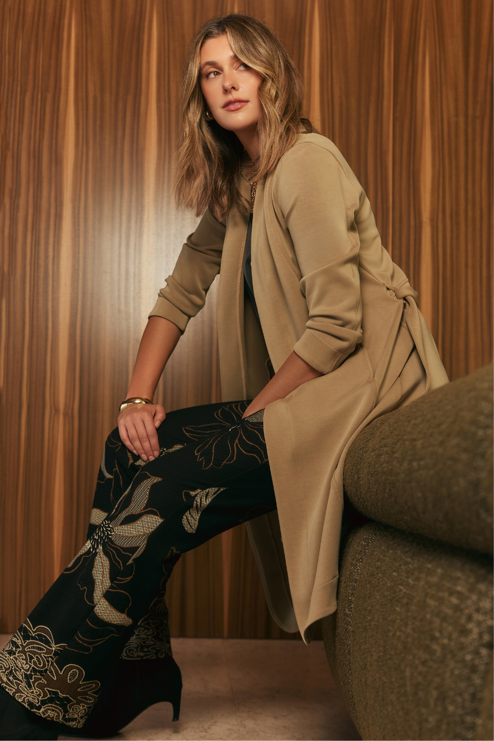 Sorel Trench Coat crafted from soft-touch Modal fabric with minimal creasing, tailored panel detailing and a sophisticated belted design for elevated everyday style.