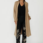 Women's Gilded Noir Pant in a premium stretch jacquard knit, designed with a comfortable pull-on waist, angled front pockets and a sophisticated full-length bootcut leg.