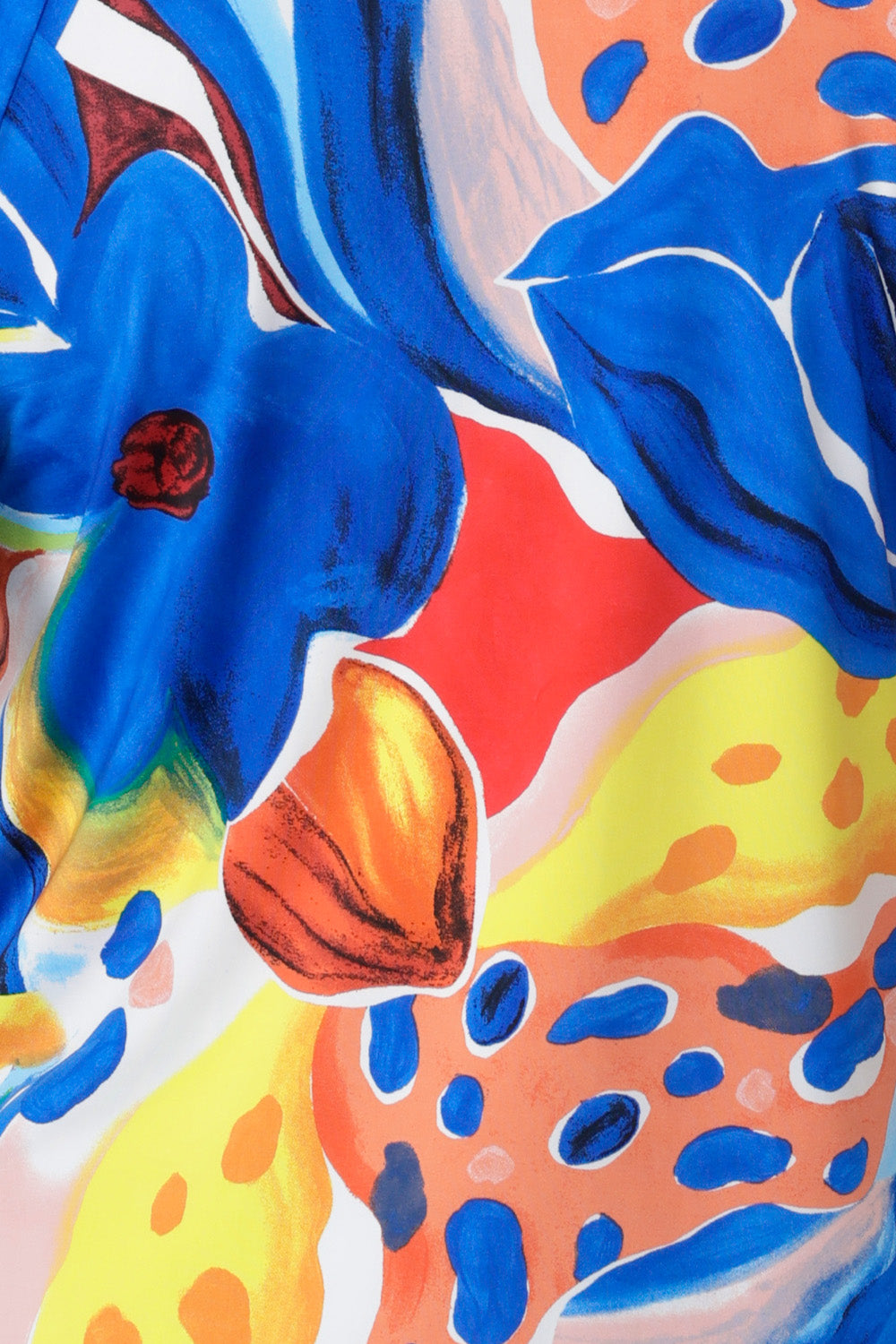 Close up image of Summer Bliss fabric swatch used to create a collection of resort ready garments including, dresses, pants and tops for women on vacation available in sizes 8-24.