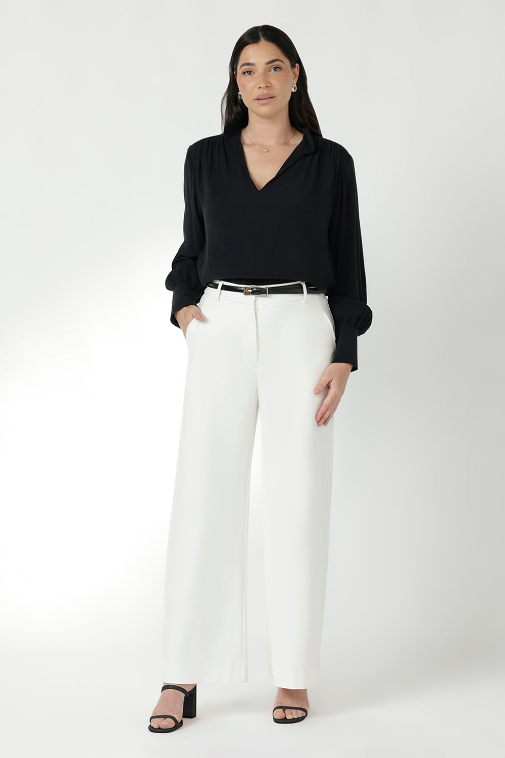 Ivory Wide Leg Pant with a high-rise waist and four-way stretch that moulds to the body for all-day comfort.