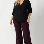 The shirttail hemline adds shape and versatility, perfect for both tucked or untucked styling. Available in sizes 8 to 24, the Terry Shirt comes in timeless Graphite or soft Vanilla. 