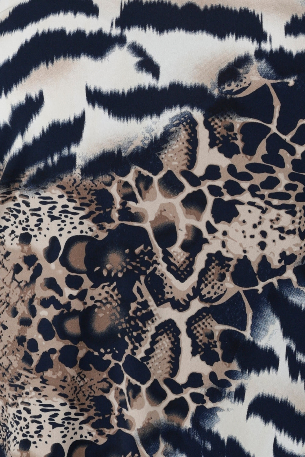 A close-up of a mixed animal print fabric featuring a leopard print section with beige, brown, and black spots, and a tiger print section with black and white stripes. Used to design a collection of dresses, tops & pants for women Sizes 8-24.