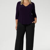 Made in Australia by Australian and New Zealand women's clothes brand, Leina & Fleur. This woman's jersey base top features a v neck, 3/4 sleeves and shirtail hem. Available in size 8-24.