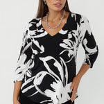 Elevate your everyday wardrobe with the Vida Top, designed in Australia using premium stretch jersey for a smooth, comfortable fit. With 3/4 sleeves, subtle shaping, and a versatile shirttail hem, it’s ideal for comfortable office wear and modern professional dressing.