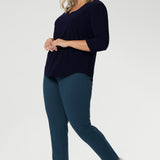 The Vida Top enhances curves with a smooth, tailored fit that feels as good as it looks. Seen from the back, the clean lines and elegant drape showcase its versatility and timeless appeal. Proudly made in Australia and available in inclusive sizes 8 to 24, the Vida Top is a must-have staple for every modern, confident woman.
