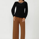 Elevate your everyday wardrobe with the Zara Top in Black, designed in Australia using premium stretch jersey. With a close-to-body fit, soft tailoring, and elegant sleeves, it’s ideal for comfortable office wear and day-to-night dressing.