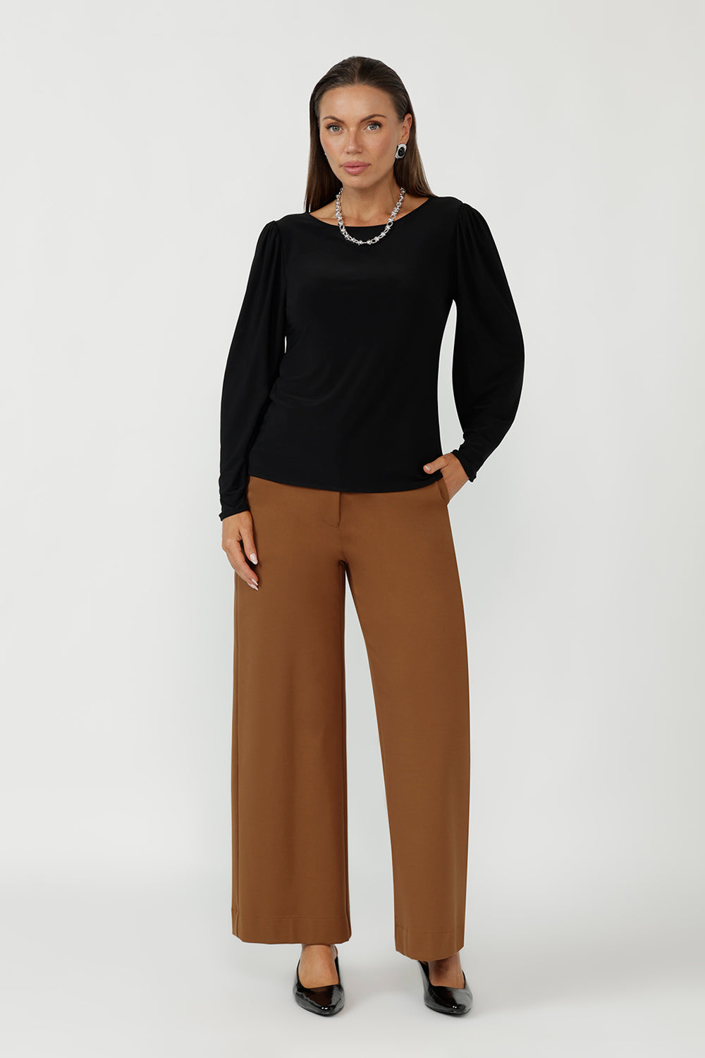 A modern essential for soft tailoring for women, the Zara Top in Black features a boat neckline, subtle shaping, and full-length bellow sleeves. Designed for real bodies in sizes 8–24, it offers a flattering fit from workwear to weekend.