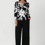 The Zara Top blends comfort and sophistication, making it a standout in women’s workwear. Designed with stretch fabric, a fitted shape, and statement sleeves, it delivers all-day wear and effortless styling for modern, professional wardrobes.