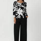 The Zara Top blends comfort and sophistication, making it a standout in women’s workwear. Designed with stretch fabric, a fitted shape, and statement sleeves, it delivers all-day wear and effortless styling for modern, professional wardrobes.