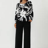 A refined take on soft tailoring for women, the Zara Top features a boat neckline, subtle bust darts, and full-length gathered sleeves. Crafted for real bodies, it offers a flattering fit and transitions seamlessly from workwear to weekend looks.