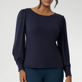 The Zara Top in Navy creates subtle shaping through the body and bust darts create a flattering, close-to-body fit that moves easily from work to weekend. The hemline is thoughtfully finished with a straight front and a slightly longer curved back for extra coverage and a polished touch. 