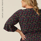 short wrap dress with fluted sleeves