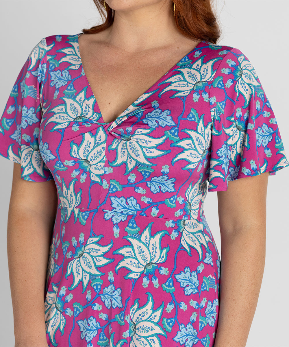 printed maxi dress with flutter sleeves and deep ruffle at the hem
